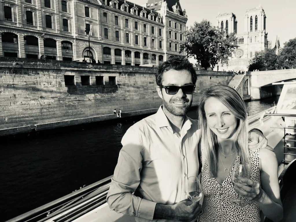 Alain and Nicola, your personal French travel designers and founders of Olea Voyages, on the Seine River in Paris