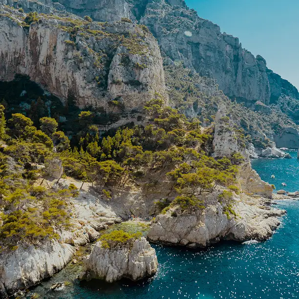 Scenic view of the Calanques with turquoise waters and limestone cliffs