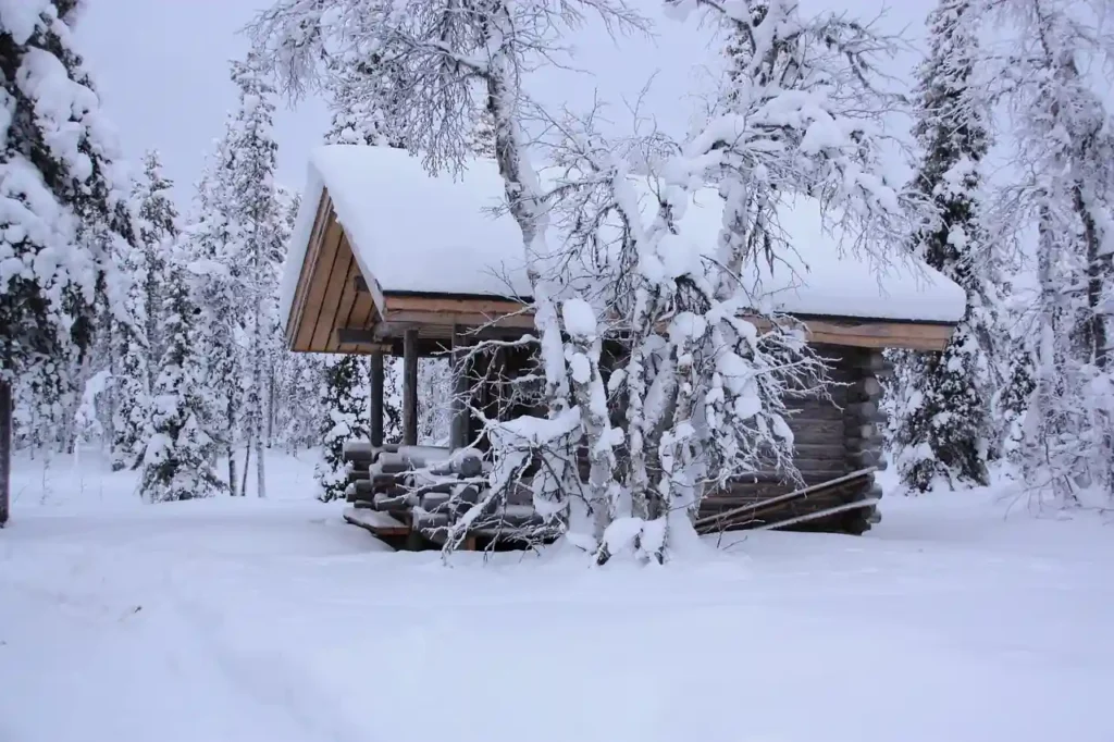 Snow-covered eco-lodge in the French Alps