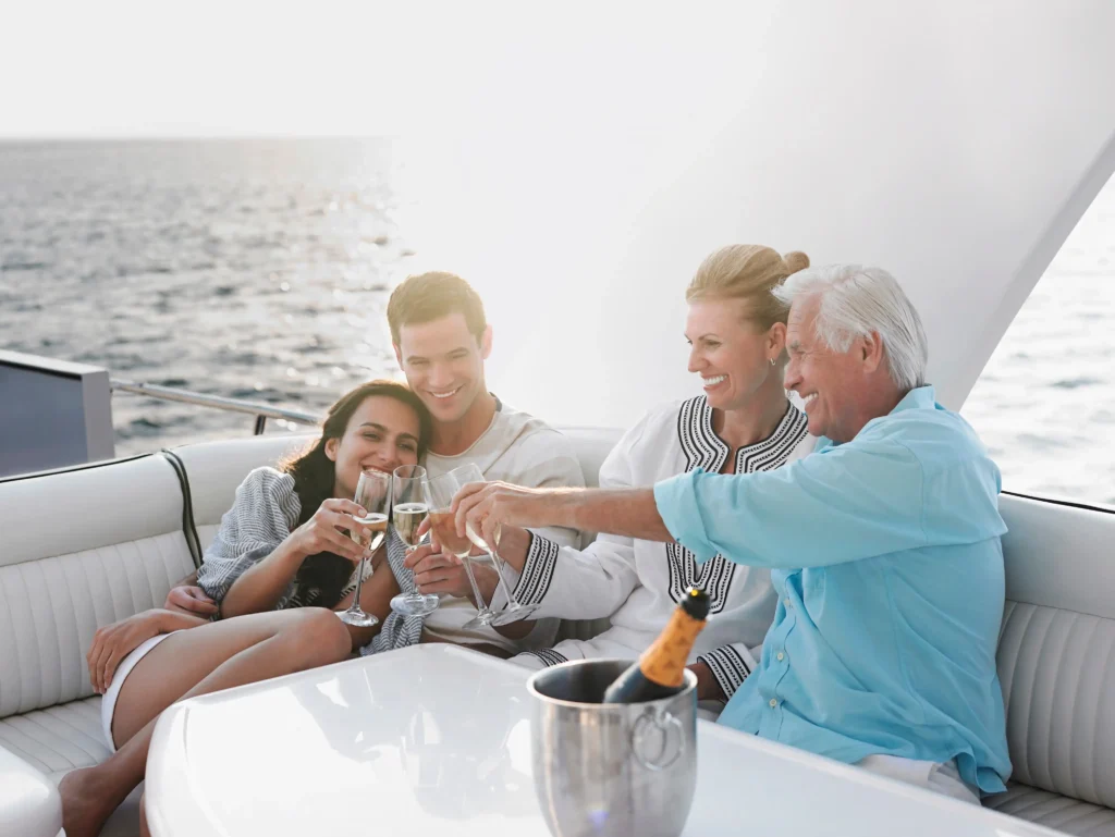 Parents and kids enjoying a private boat ride on the Riviera