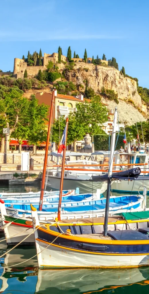 Colorful boats moored in a traditional fishing port in southern France