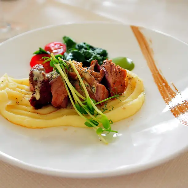 Refined gourmet dish served at a French château dinner
