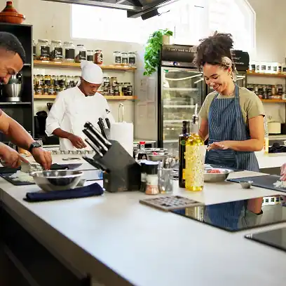French cooking class experience with friends in a gourmet kitchen
