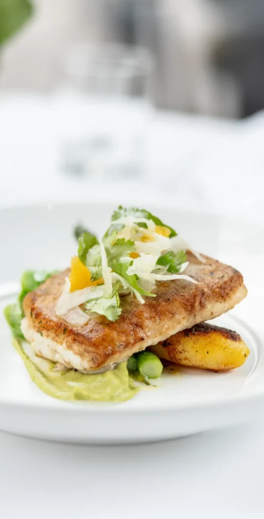 Elegant seafood dish served at a fine dining restaurant in France