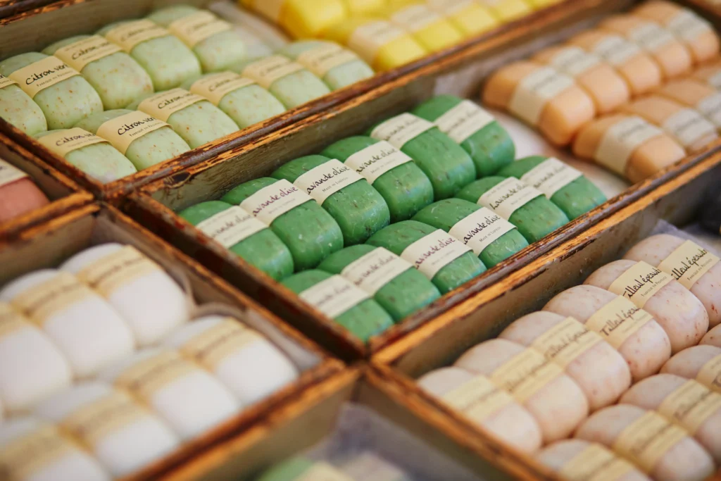 Artisanal soaps embodying the French art de vivre in a Provençal market