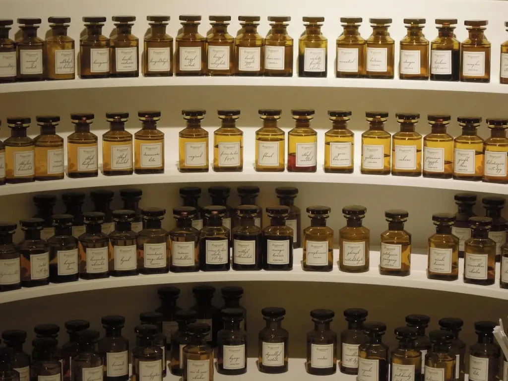 Shelves lined with artisanal perfume bottles in Grasse