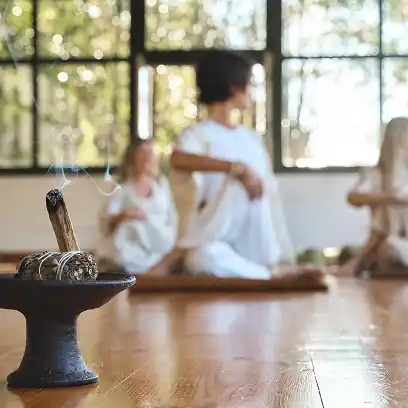 Woman practicing yoga in a peaceful indoor studio