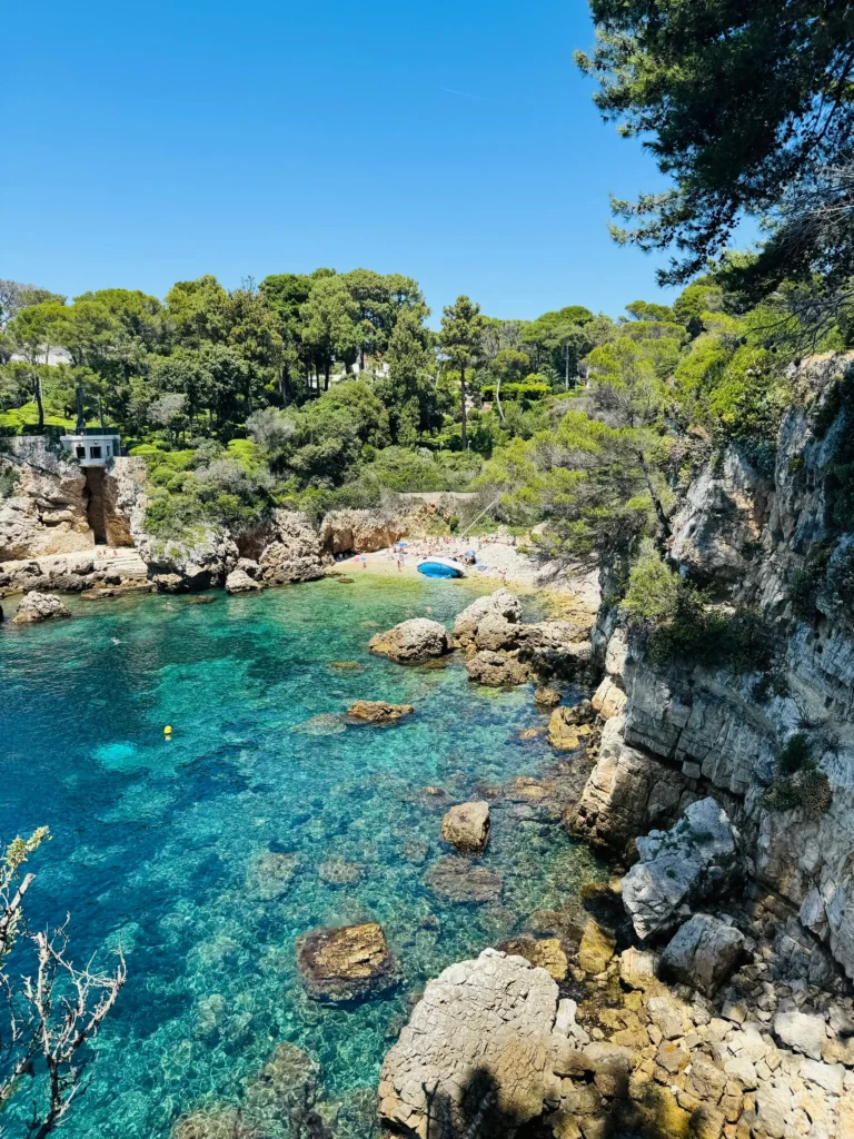 Turquoise waters and rocky coastline on the French Riviera in summer