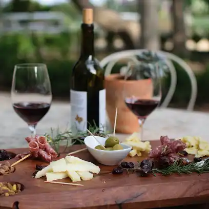 Wine, cheese, and gourmet conversation in a French private estate