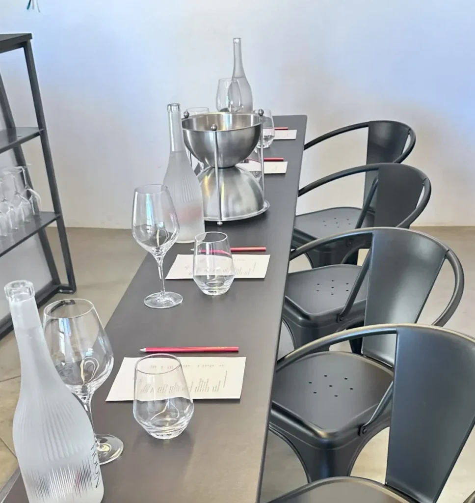 Elegant fine dining restaurant terrace with modern table settings and wine glasses