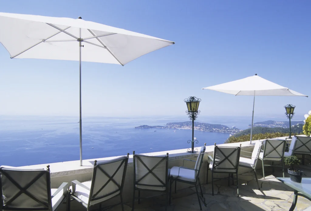 Elegant Mediterranean terrace with panoramic ocean views and luxury outdoor seating