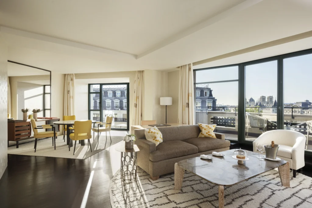 Spacious Notre Dame suite with elegant living room and panoramic Seine River views