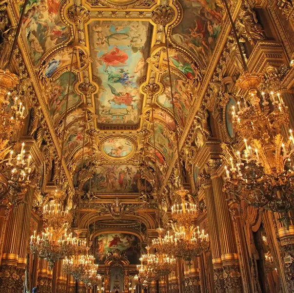 Gilded palace interior showcasing French baroque architecture and heritage