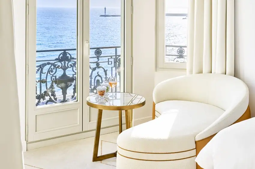 Bright one-bedroom sea-view suite at the Carlton Cannes with balcony and lounge chair