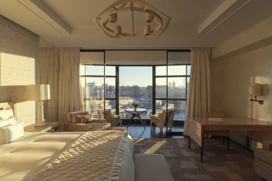 Junior Suite Seine at Cheval Blanc Paris with floor-to-ceiling windows and river views.[memory:2]