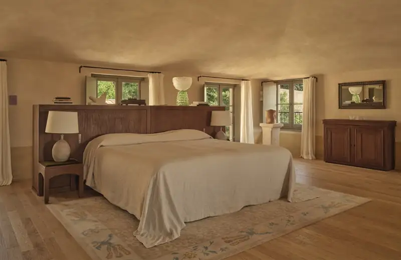 Warm, minimalist luxury suite at Hotel du Couvent in Nice