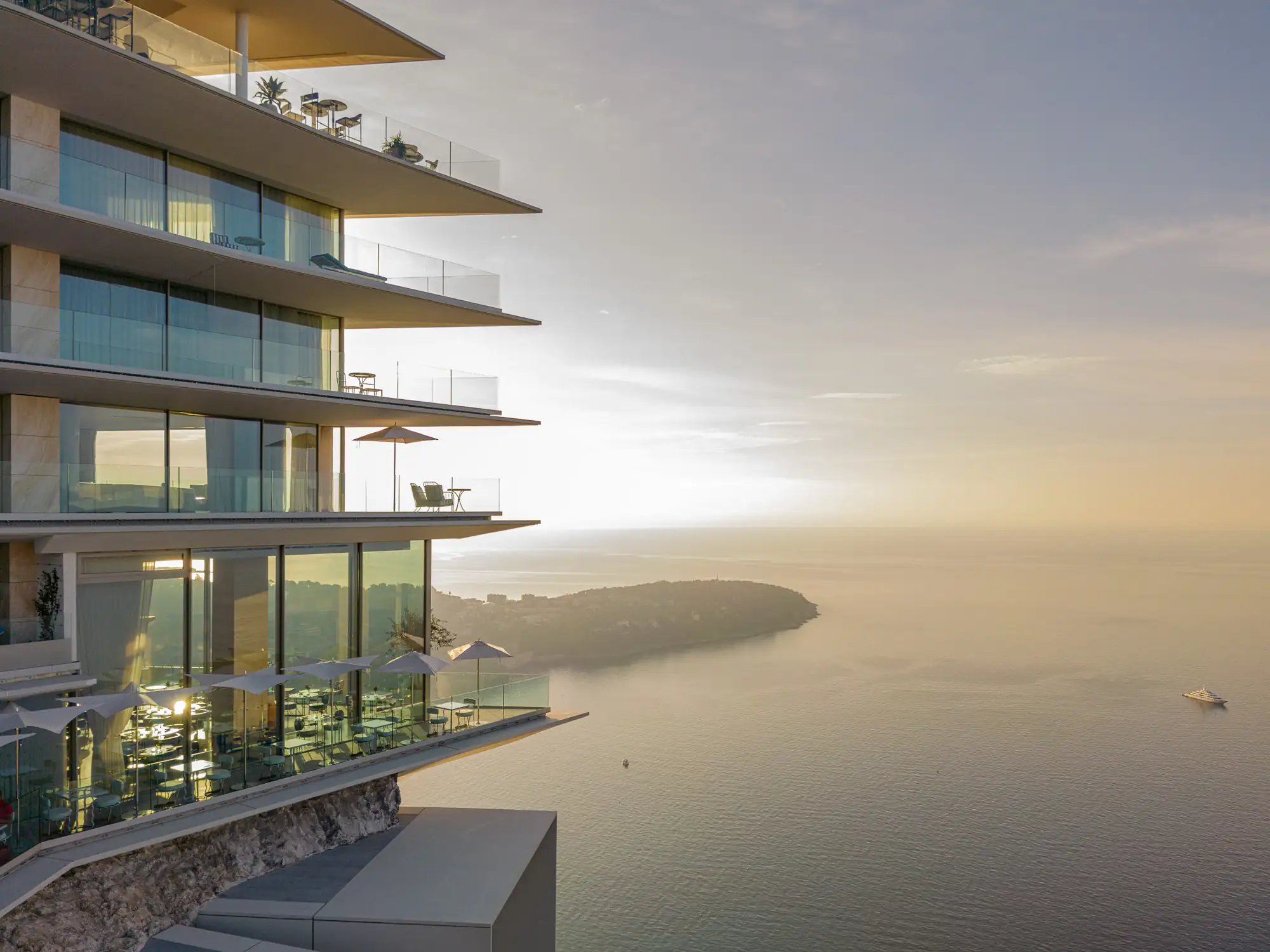Luxury French Riviera hotel overlooking the Mediterranean Sea at sunset