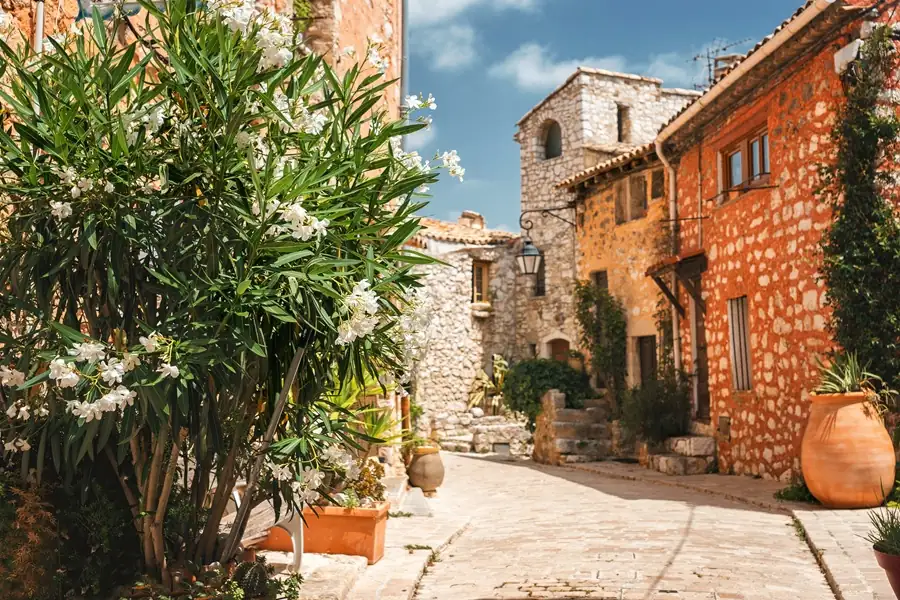 Contemporary white marble art gallery interior with geometric columns and Mediterranean light