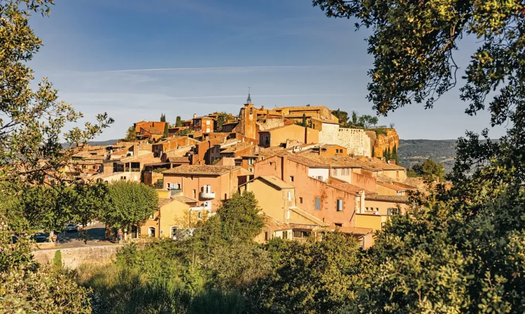 Roussillon ochre village perched on hilltop in Luberon Provence France