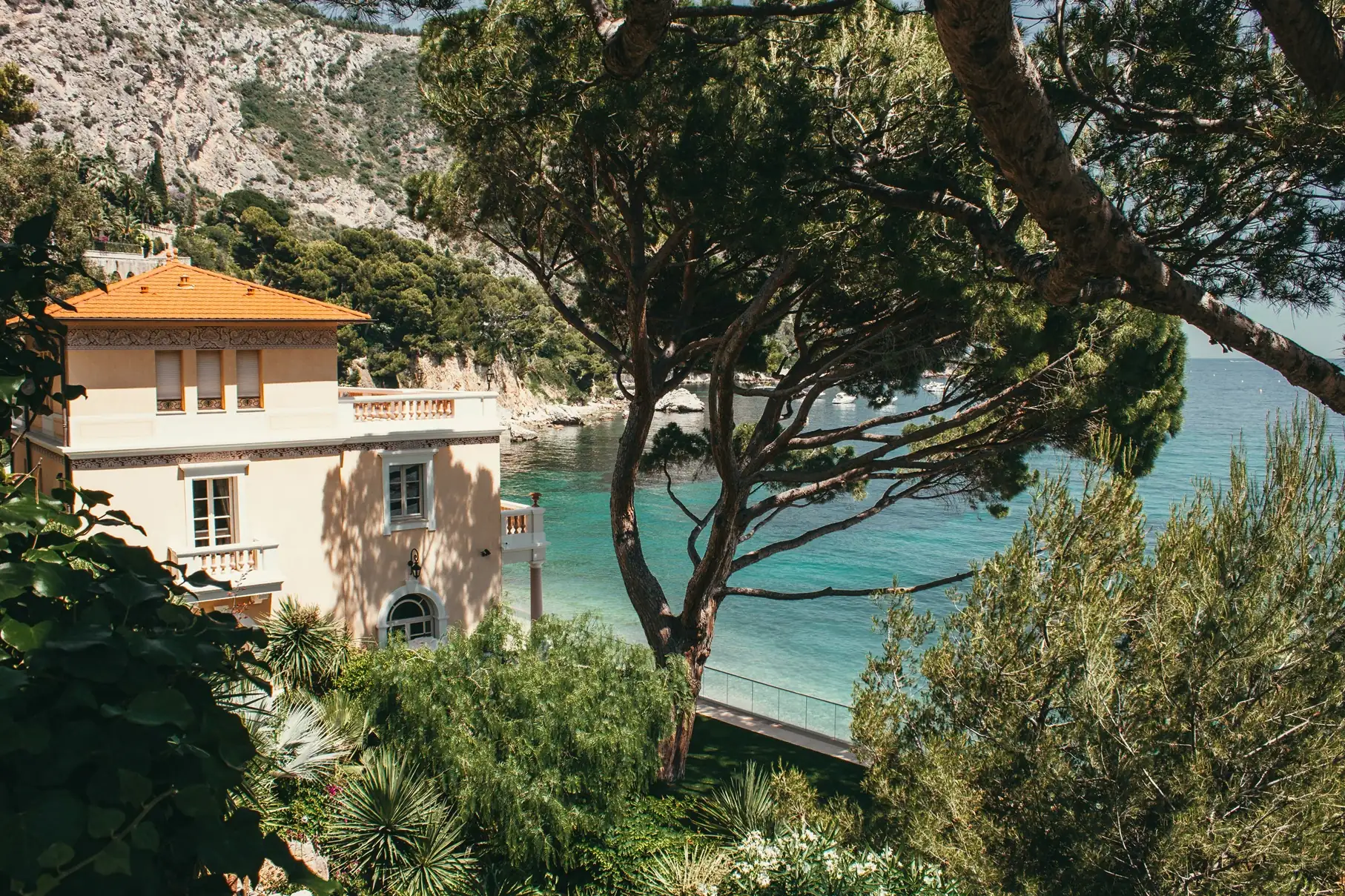 Secluded cliffside villa with pine trees and turquoise sea views on the French Riviera