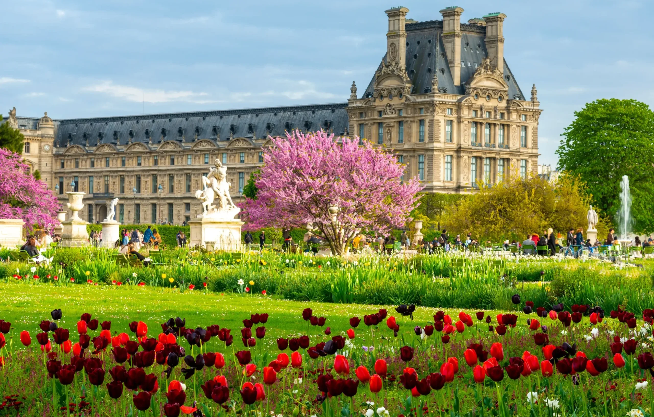 The Roue de Paris ferris wheel viewed from the manicured lawns of the Tuileries Garden