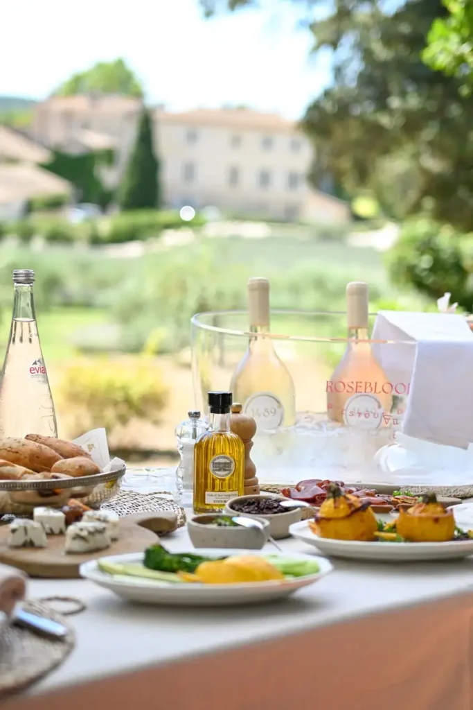 Luxury picnic in Provence with rosé wine and gourmet dishes