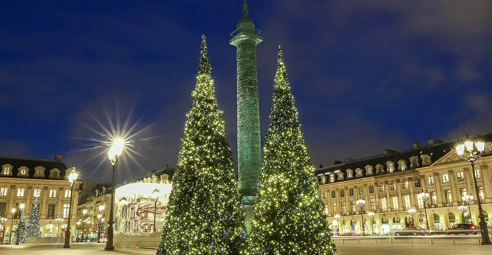 Christmas in Paris, trees and the Vendôme Column at Place Vendôme in Paris during the holiday season